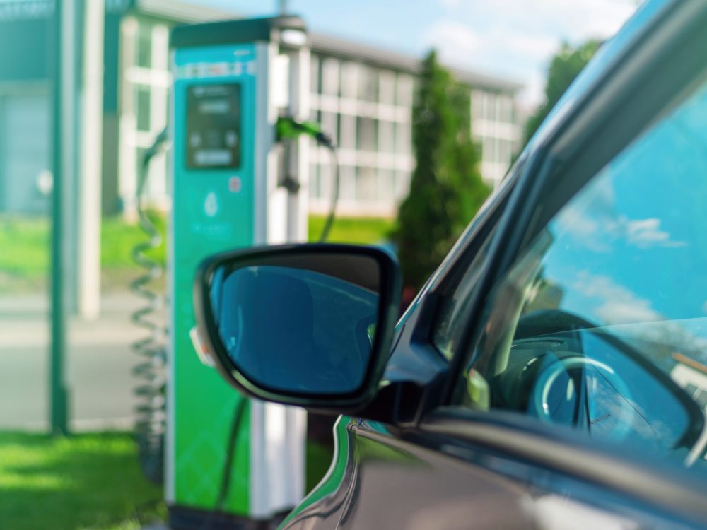 Parked cars near charge station in the city